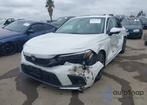 2024 Honda Civic Touring from USA, damaged, VIN 2HGFE1F9XRH330844